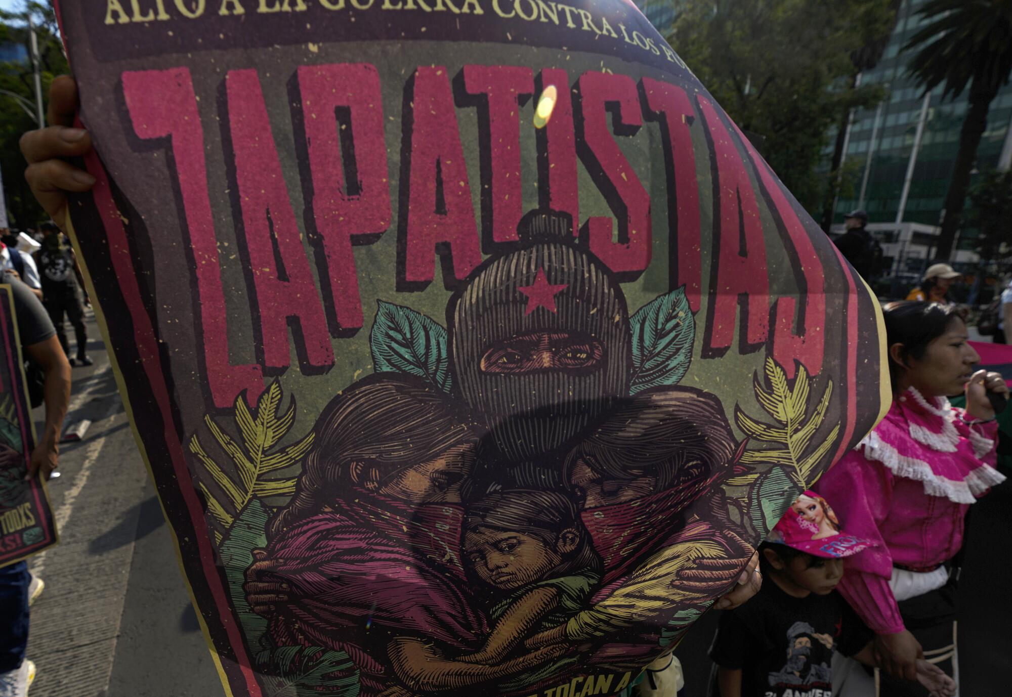 A poster with the words Zapatistas and a drawing of a masked person embracing three people 