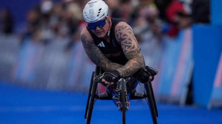 Britain's David Weir finishes the men's marathon T54 at the 2024 Paralympics, Sunday, Sept. 8, 2024, in Paris, France. (AP Photo/Thibault Camus)