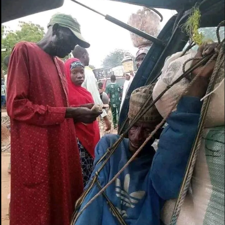 Heartbreaking photo of Nigerian man tied to luggage in car boot over transport hike causes stir