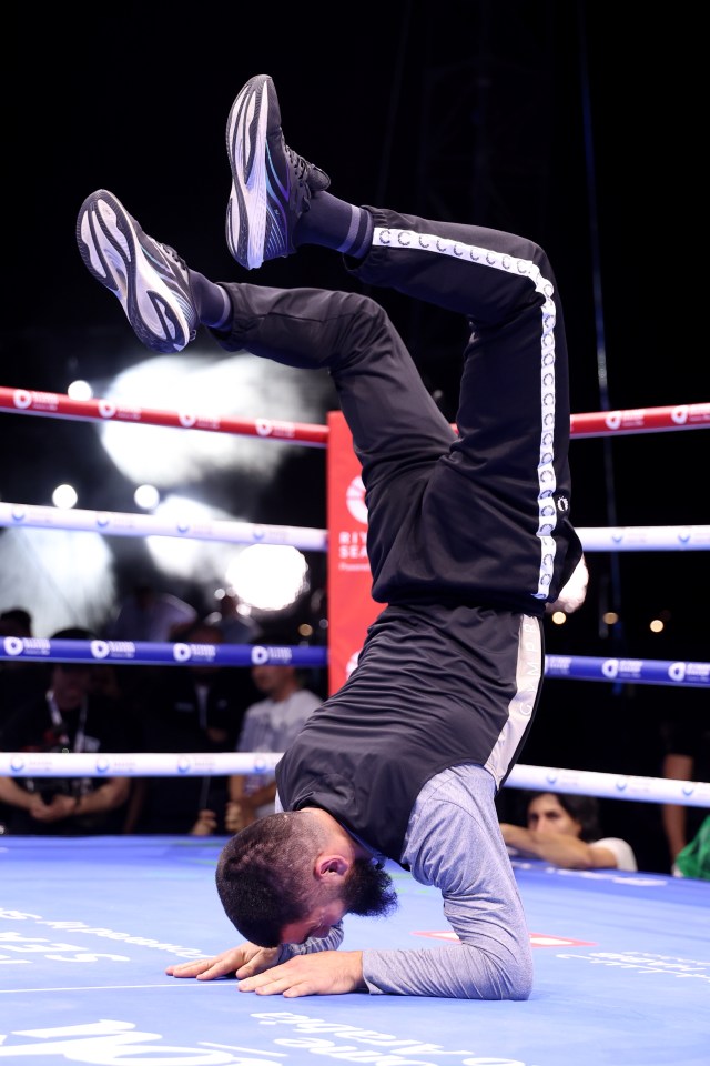 Beterbiev performed a hand stand on his forearms to finish his insane routine