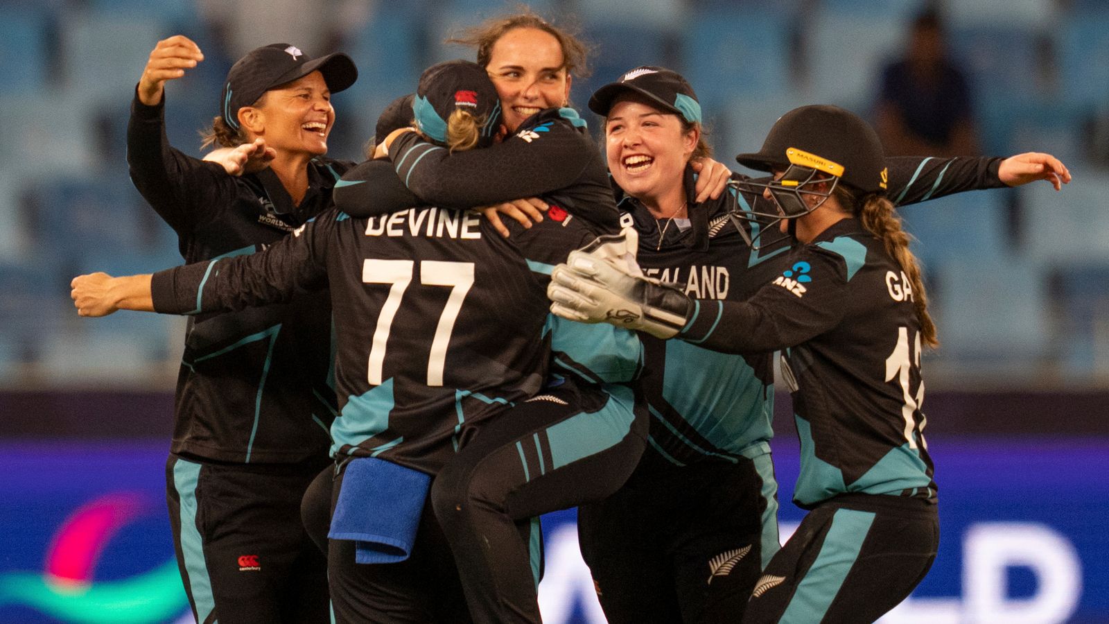 New Zealand players celebrate their win against Pakistan during the ICC Women's T20 World Cup 2024 match at Dubai International Stadium, United Arab Emirates, Monday, Oct. 14, 2024. (AP Photo/Altaf Qadri)