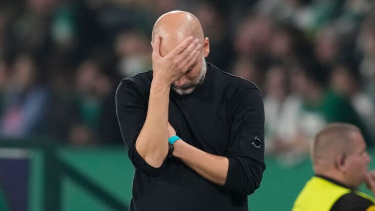 Manchester City's head coach Pep Guardiola reacts during the UEFA Champions League opening phase soccer match between Sporting and Manchester City in Lisbon, Portugal, Tuesday, Nov. 5, 2024. (AP Photo/Armando Franca)