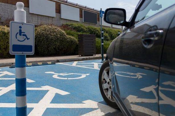 Paraplegic man and son teach police officer a lesson for misusing disabled parking spot