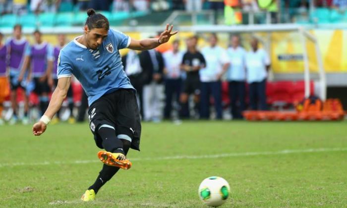 Caceres in action for Uruguay